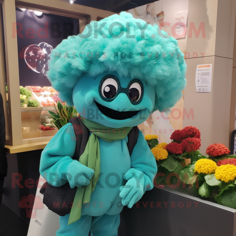 Turquoise Cauliflower mascot costume character dressed with a Blouse and Beanies Turquoise Cauliflower mascot costume character dressed with a Blouse and Beanies