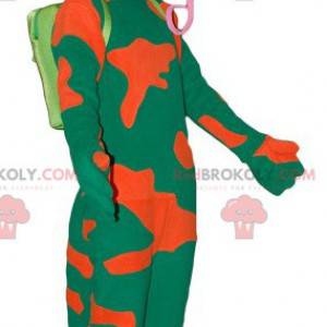 Mascot green and orange chameleon with a big tongue -