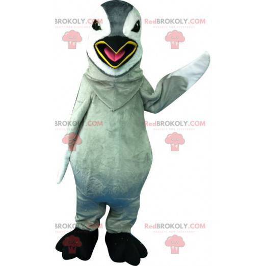 Mascote de pinguim cinza e branco. Pinguim gigante -