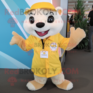 Yellow Ferret mascot costume character dressed with a T-Shirt and Lapel pins