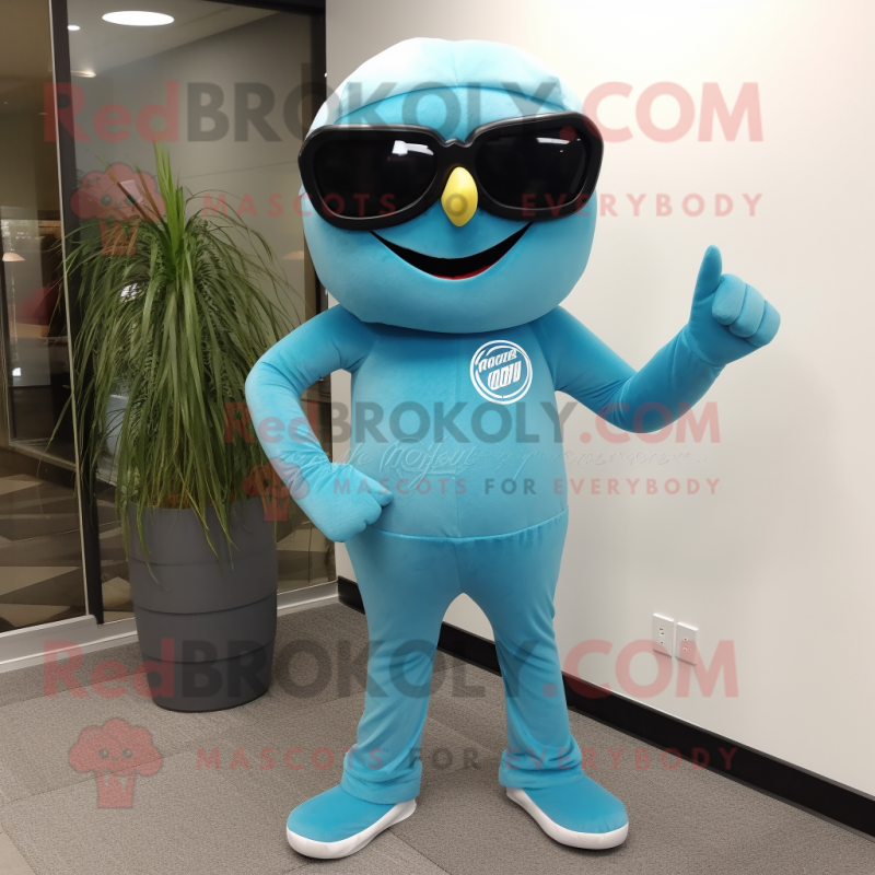 Cyan Knife Thrower mascot costume character dressed with a Jeggings and Sunglasses