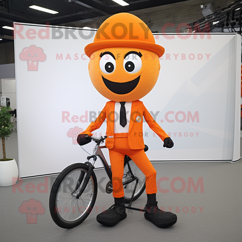 Orange Unicyclist mascot costume character dressed with a Suit and Caps