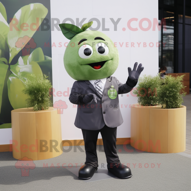 Olive Apple mascot costume character dressed with a Blazer and Gloves