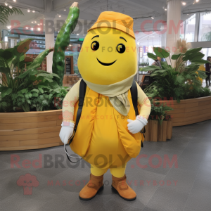 Yellow Zucchini mascot costume character dressed with a Waistcoat and Messenger bags
