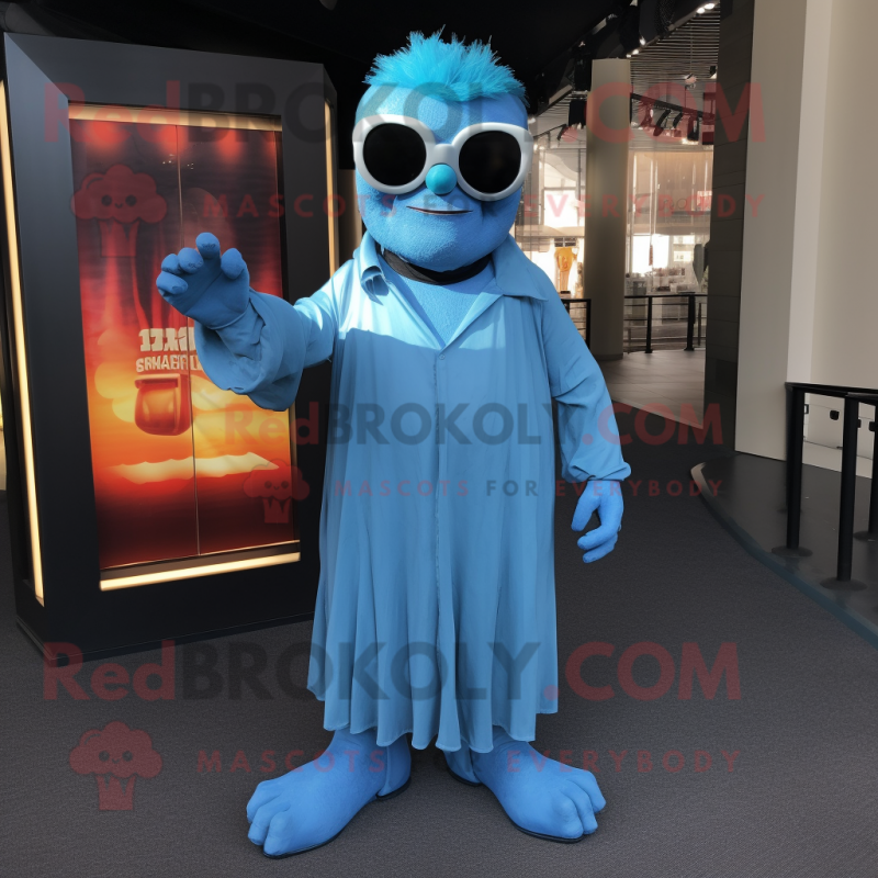 Blue Frankenstein mascot costume character dressed with a Maxi Dress and Sunglasses Blue Frankenstein mascot costume character dressed with a Maxi Dress and Sunglasses