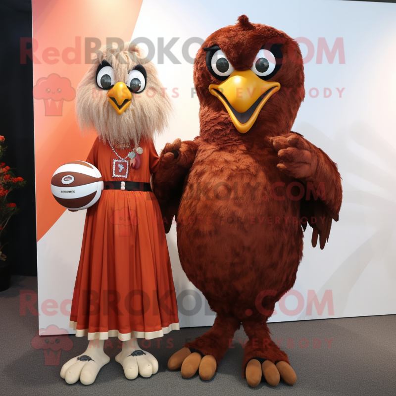 Rust Eagle mascot costume character dressed with a Ball Gown and Handbags Rust Eagle mascot costume character dressed with a Ball Gown and Handbags