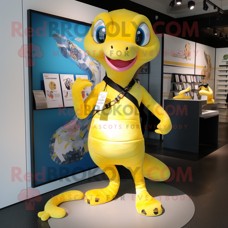 Yellow Python mascot costume character dressed with a Swimwear and Keychains Yellow Python mascot costume character dressed with a Swimwear and Keychains