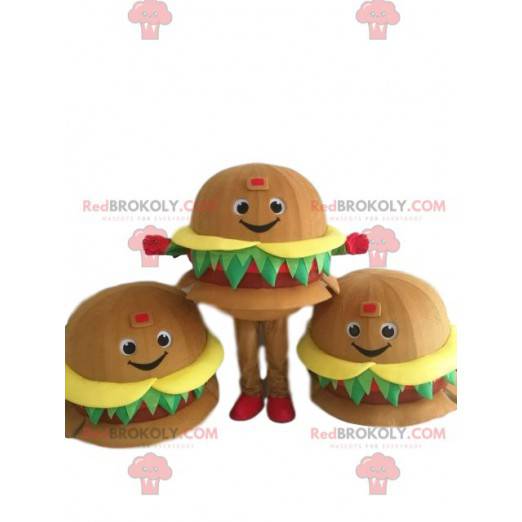 Gigantyczna maskotka hamburger, uśmiechnięta i apetyczna -