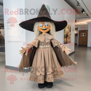 Tan Witch mascot costume character dressed with a Culottes and Hat pins