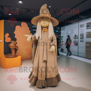 Tan Witch mascot costume character dressed with a Culottes and Hat pins