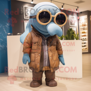 Brown Blue Whale mascot costume character dressed with a Parka and Eyeglasses