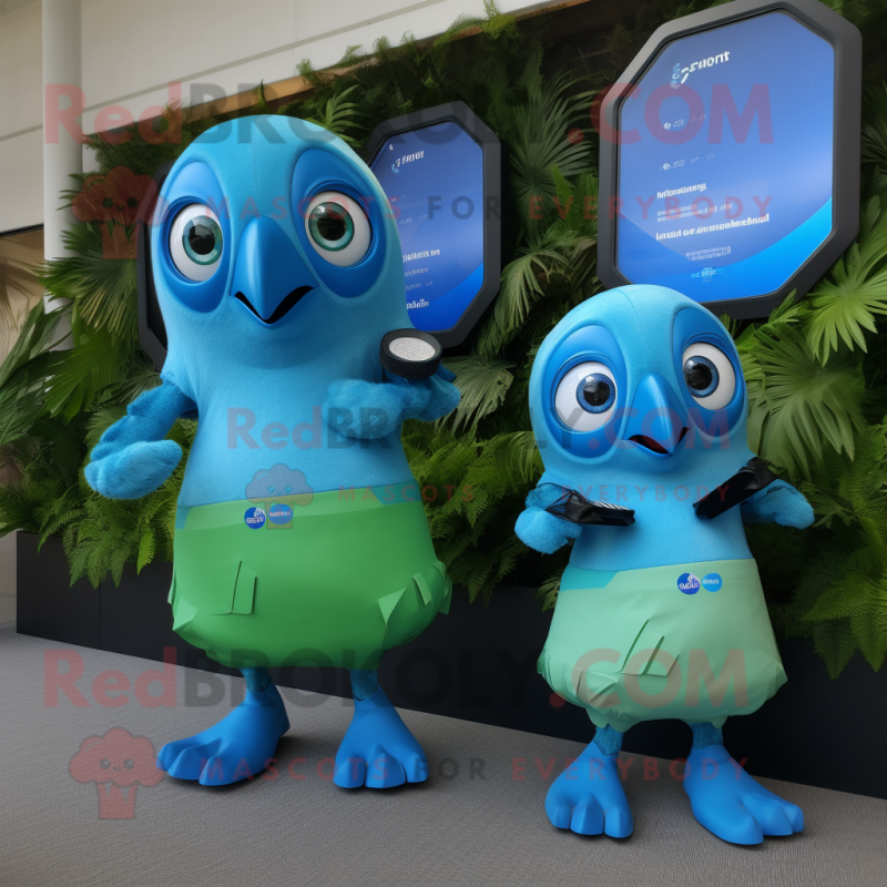 Blue Kiwi mascot costume character dressed with a Bikini and Smartwatches Blue Kiwi mascot costume character dressed with a Bikini and Smartwatches