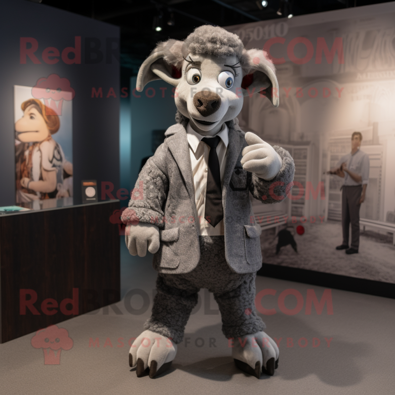 Gray Ram mascot costume character dressed with a Suit Jacket and Headbands Gray Ram mascot costume character dressed with a Suit Jacket and Headbands