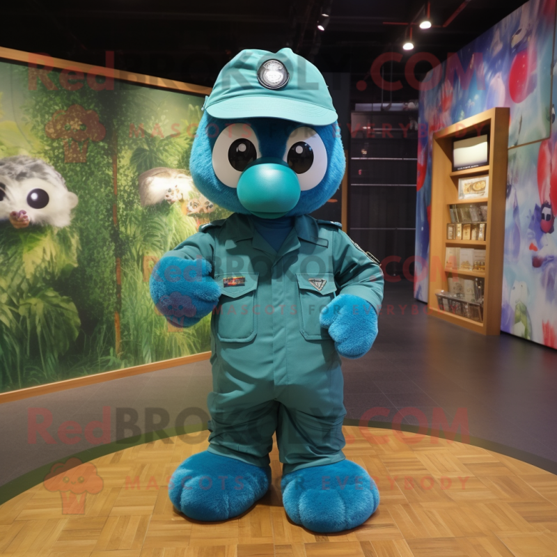 Teal Para Commando mascot costume character dressed with a Romper and Caps Teal Para Commando mascot costume character dressed with a Romper and Caps
