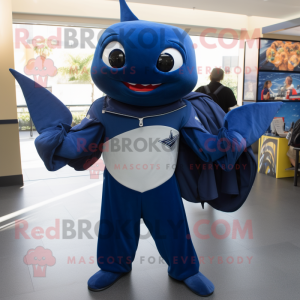 Navy Manta Ray mascot costume character dressed with a Turtleneck and Backpacks