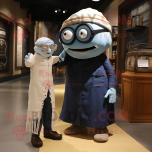 nan Cyclops mascot costume character dressed with a Oxford Shirt and Shawls