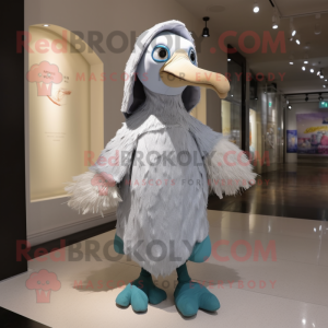 Silver Ostrich mascot costume character dressed with a Raincoat and Beanies