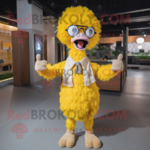 Yellow Ostrich mascot costume character dressed with a Henley Shirt and Eyeglasses