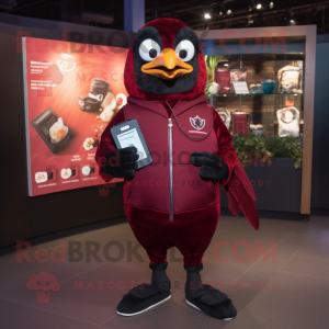Maroon Blackbird mascot costume character dressed with a Sweatshirt and Coin purses