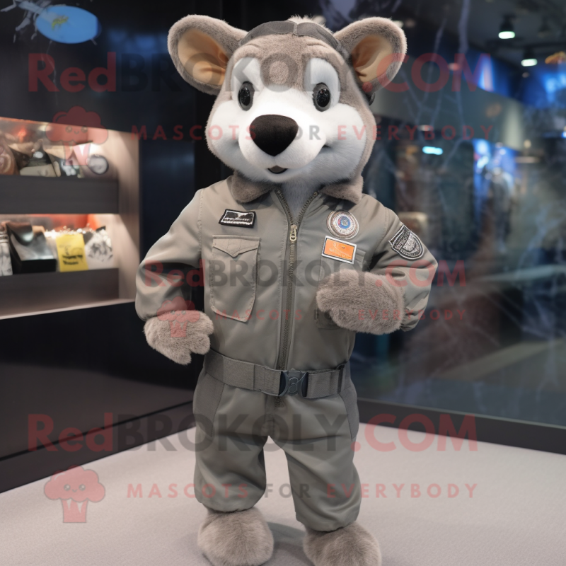 Gray Special Air Service mascot costume character dressed with a Bomber Jacket and Lapel pins