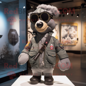 Gray Special Air Service mascot costume character dressed with a Bomber Jacket and Lapel pins