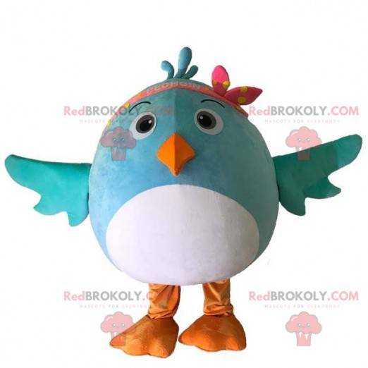 Weißes und blaues Vogelkostümmaskottchen, rund und niedlich -