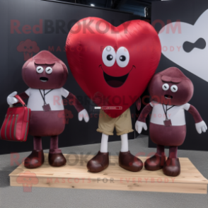 Maroon Heart Shaped Balloons mascot costume character dressed with a Jeans and Briefcases