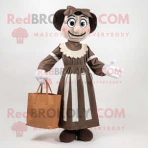 Brown Mime mascot costume character dressed with a Dress and Tote bags