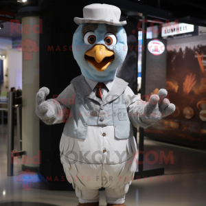 Silver Turkey mascot costume character dressed with a Poplin Shirt and Gloves