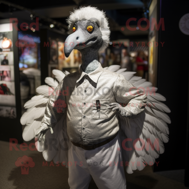 Silver Turkey mascot costume character dressed with a Poplin Shirt and Gloves