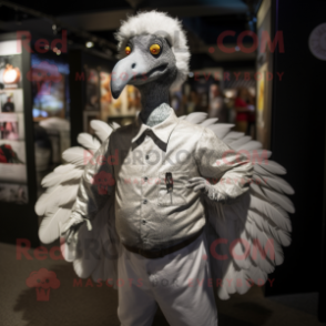 Silver Turkey mascot costume character dressed with a Poplin Shirt and Gloves