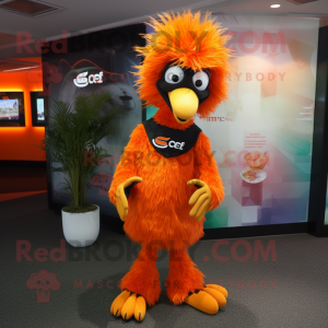 Orange Emu mascot costume character dressed with a Culottes and Rings