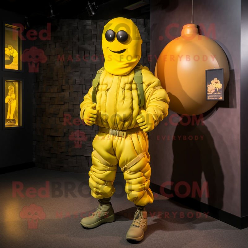 Yellow Grenade mascot costume character dressed with a Joggers and Shoe laces