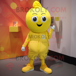 Yellow Grenade mascot costume character dressed with a Joggers and Shoe laces