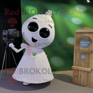 Olive Camera mascot costume character dressed with a Wedding Dress and Keychains