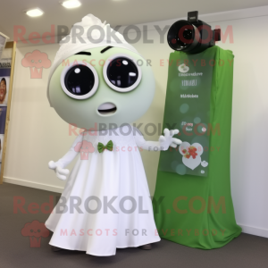 Olive Camera mascot costume character dressed with a Wedding Dress and Keychains