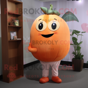 Peach Pumpkin mascot costume character dressed with a Long Sleeve Tee and Tie pins