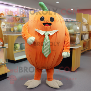 Peach Pumpkin mascot costume character dressed with a Long Sleeve Tee and Tie pins