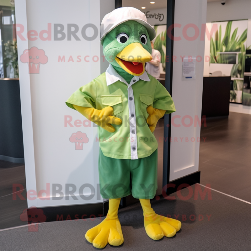 Lime Green Gosling mascot costume character dressed with a Poplin Shirt and Beanies Lime Green Gosling mascot costume character dressed with a Poplin Shirt and Beanies
