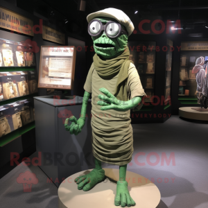 Forest Green Mummy mascot costume character dressed with a Cargo Shorts and Reading glasses