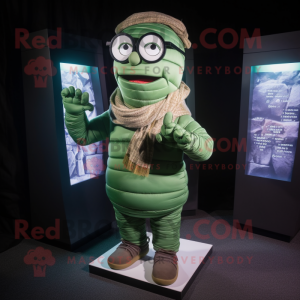 Forest Green Mummy mascot costume character dressed with a Cargo Shorts and Reading glasses