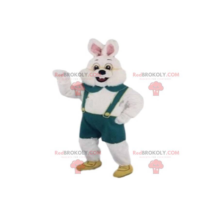 Mascot white rabbit with green overalls. Bunny costume -