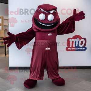 Maroon Moussaka mascot costume character dressed with a Jeggings and Gloves