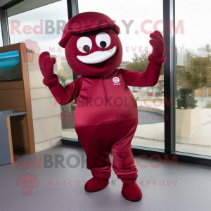 Maroon Moussaka mascot costume character dressed with a Jeggings and Gloves