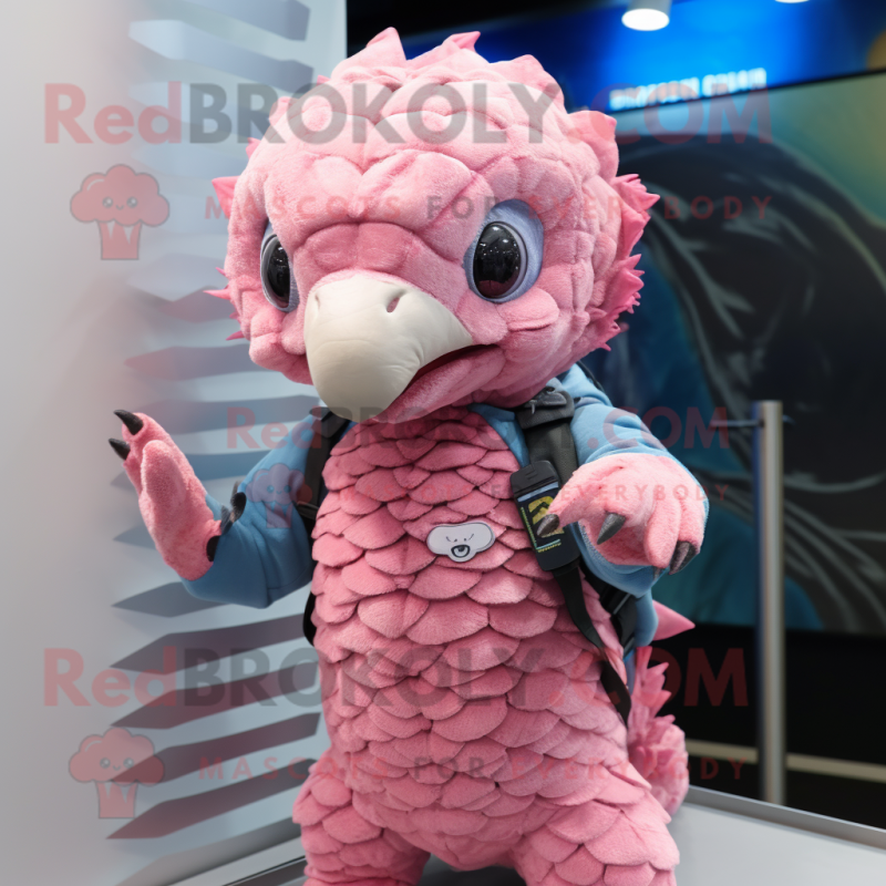 Pink Pangolin mascot costume character dressed with a Denim Shorts and Mittens