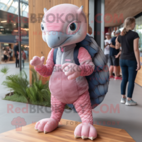 Pink Pangolin mascot costume character dressed with a Denim Shorts and Mittens