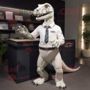 White Tyrannosaurus mascot costume character dressed with a Polo Shirt and Ties