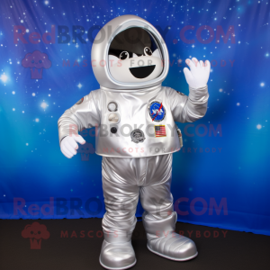 Silver Astronaut mascot costume character dressed with a Henley Shirt and Scarf clips