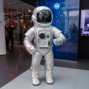 Silver Astronaut mascot costume character dressed with a Henley Shirt and Scarf clips