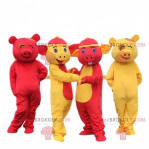4 mascottes cochons jaunes et rouges. 4 cochons colorés Asie -
